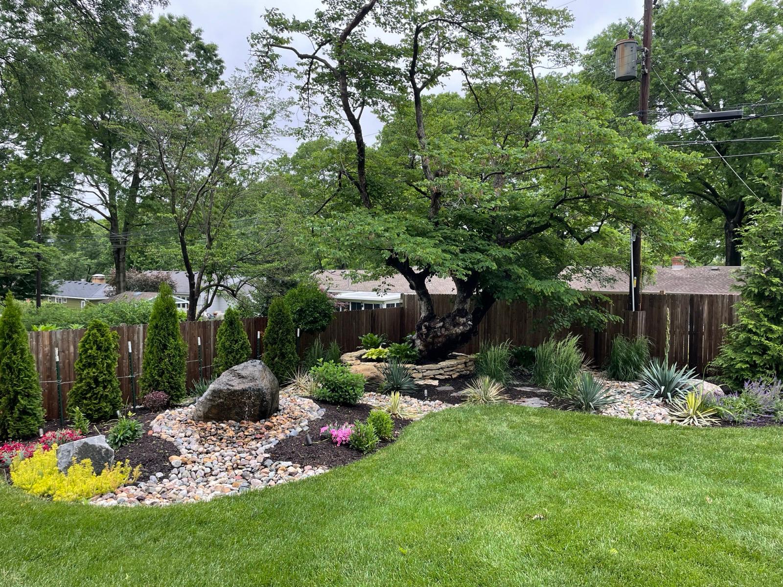 Stone pathway leading through yard