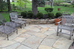Custom hardscaping services in Kansas City, including patios, retaining walls, walkways, and outdoor living spaces by Mountain Landscaping. Hardscaping services in Kansas City featuring a custom patio, retaining wall, and outdoor living space by Mountain Landscaping